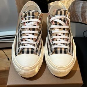 Mens Burberry sneakers size 9. Worn once very minor scuffs, barely noticeable